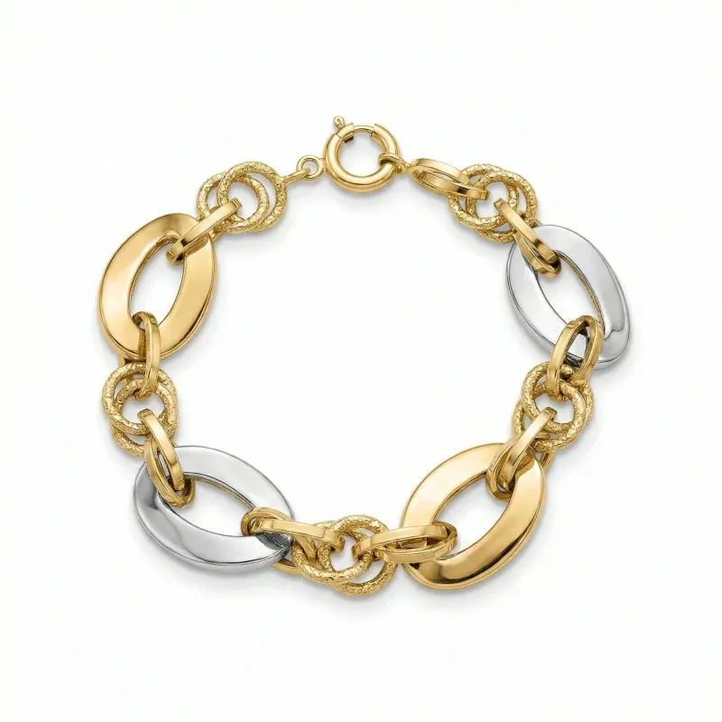 18K gold Mazimo collection oval link bracelet with textured gold rings and white gold accents, 11.40 grams