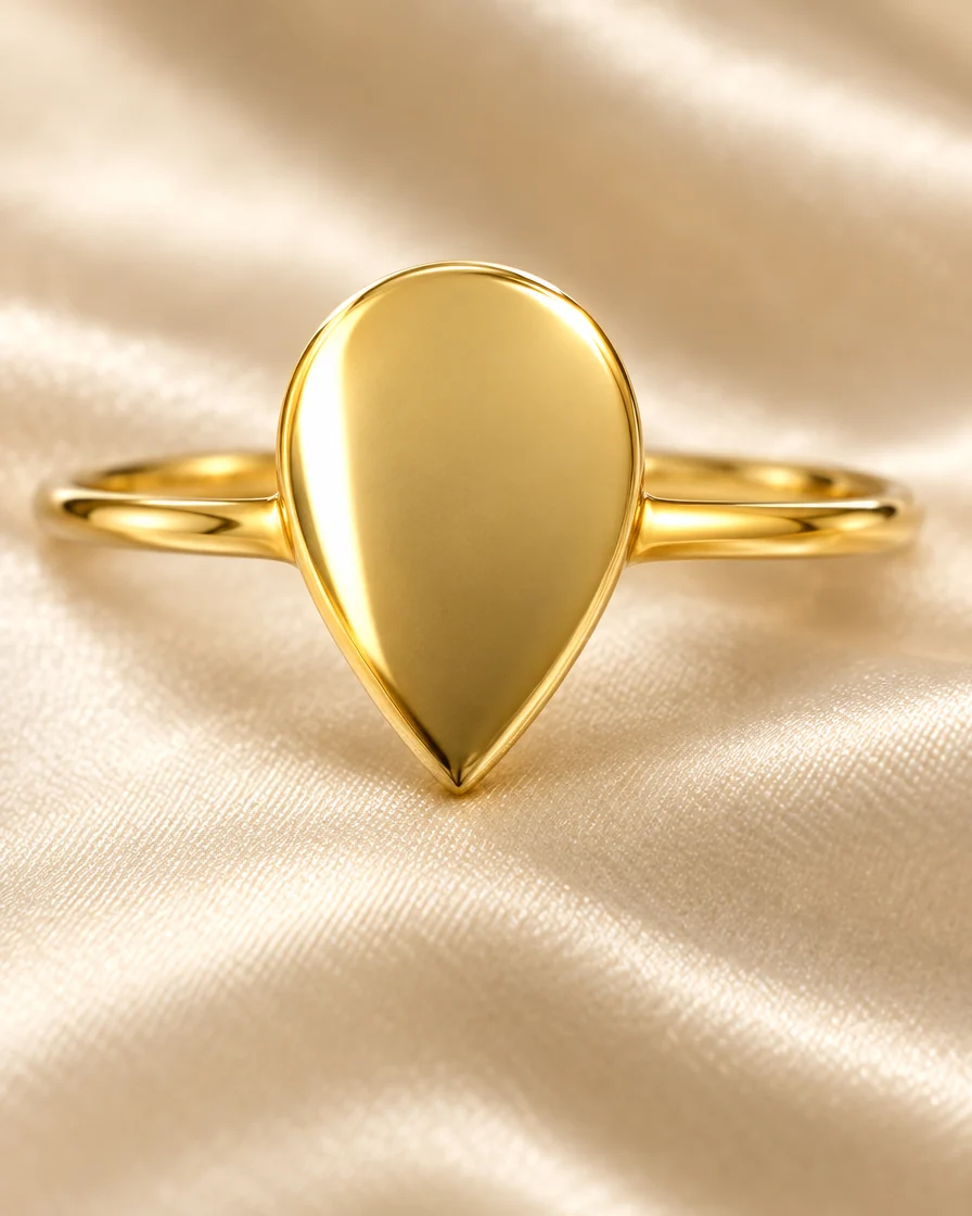 Macro of the polished teardrop face and slim round band