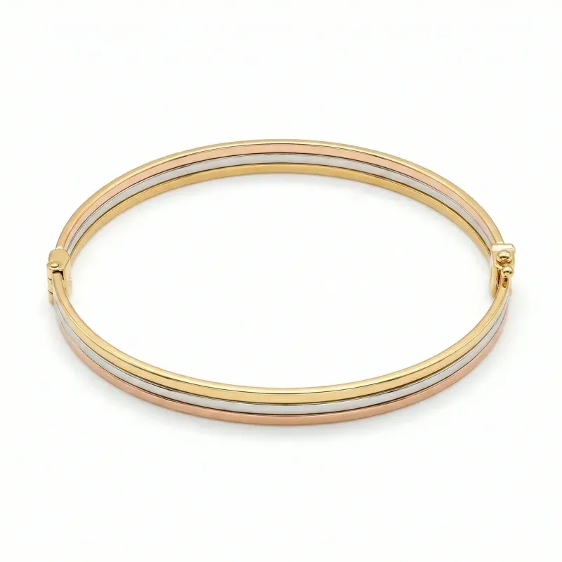 18K gold Mazimo collection tri-tone slim bangle with yellow, white, and rose gold bands, 7.40 grams