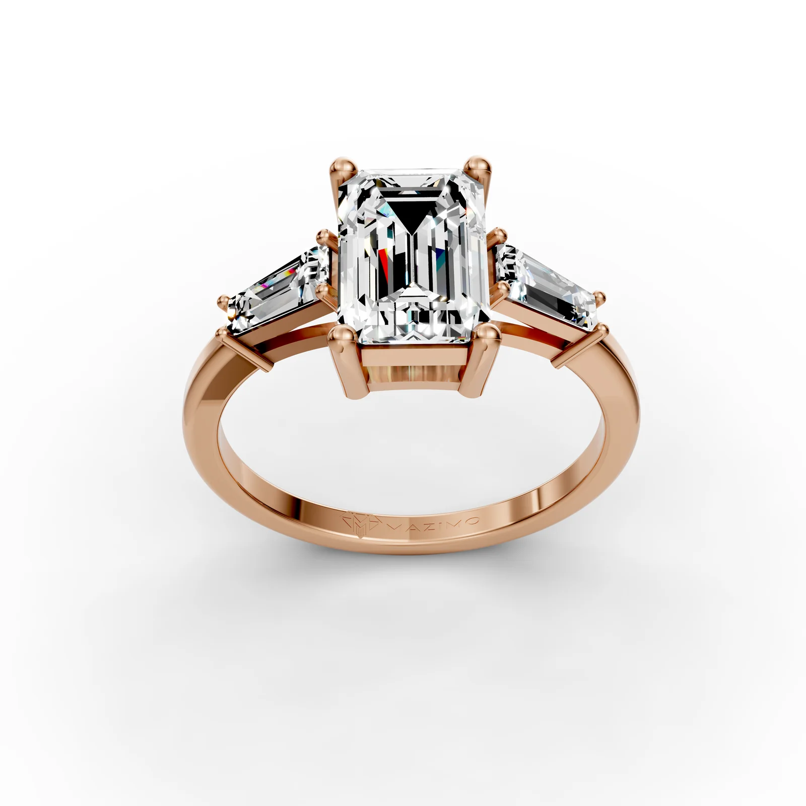 Emerald and Baguette Three Stone Ring in 18K Rose Gold, 2 ct emerald-cut diamond with two tapered baguettes, three-quarter view