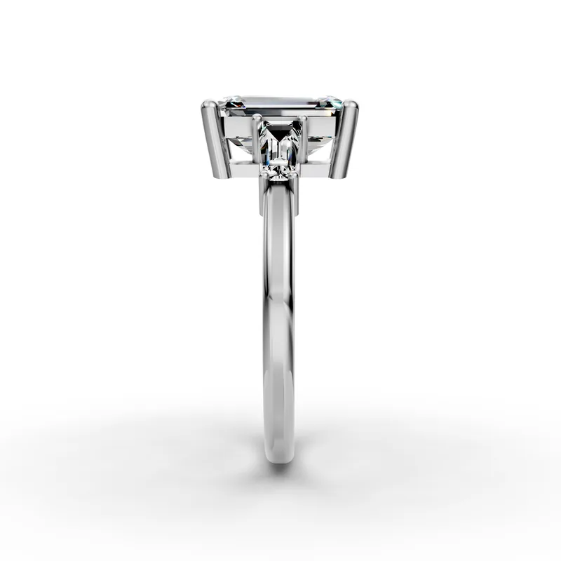 Emerald and Baguette Three Stone Ring in 18K White Gold, 2 ct emerald-cut diamond with two tapered baguettes, side profile