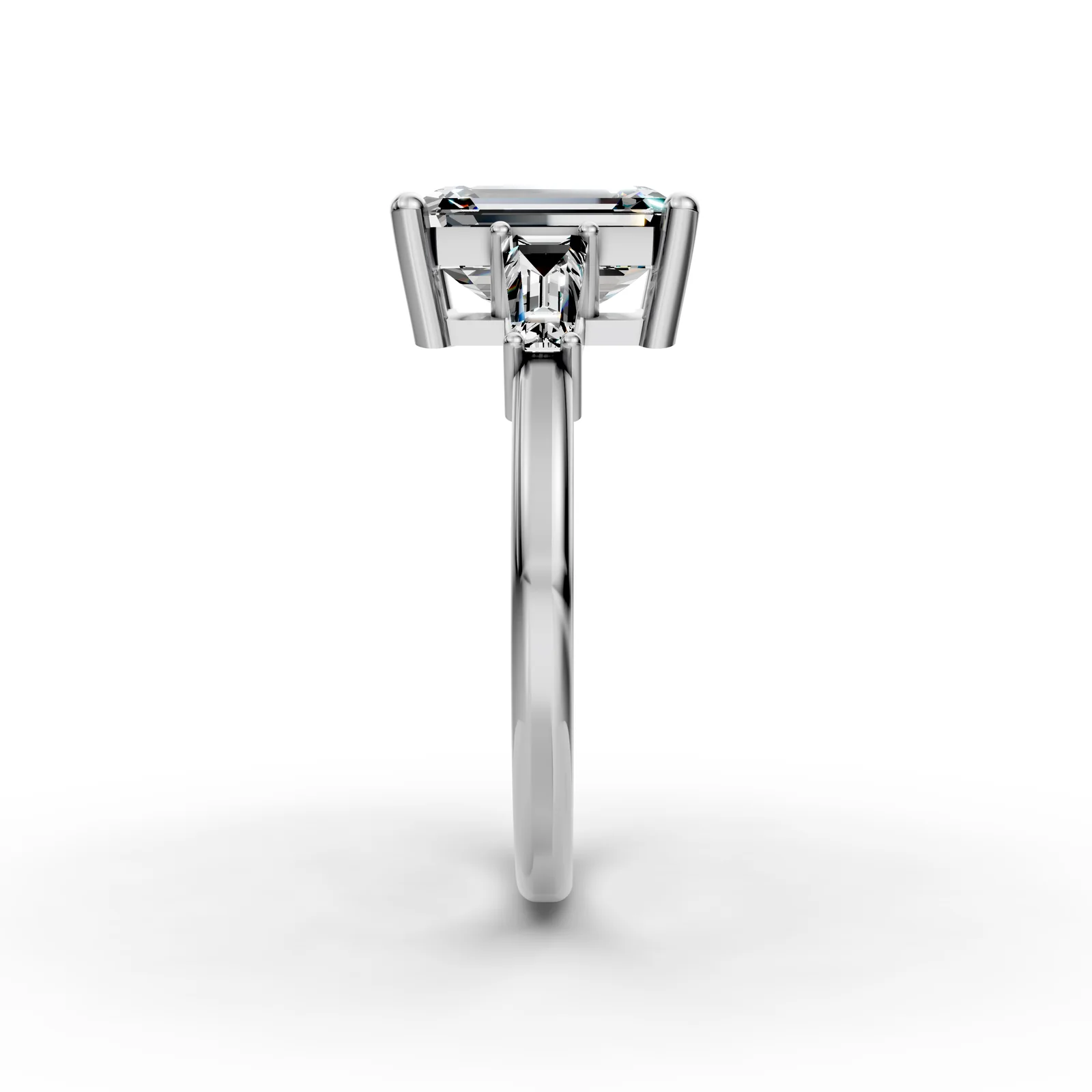 Emerald and Baguette Three Stone Ring in 18K White Gold, 2 ct emerald-cut diamond with two tapered baguettes, side profile