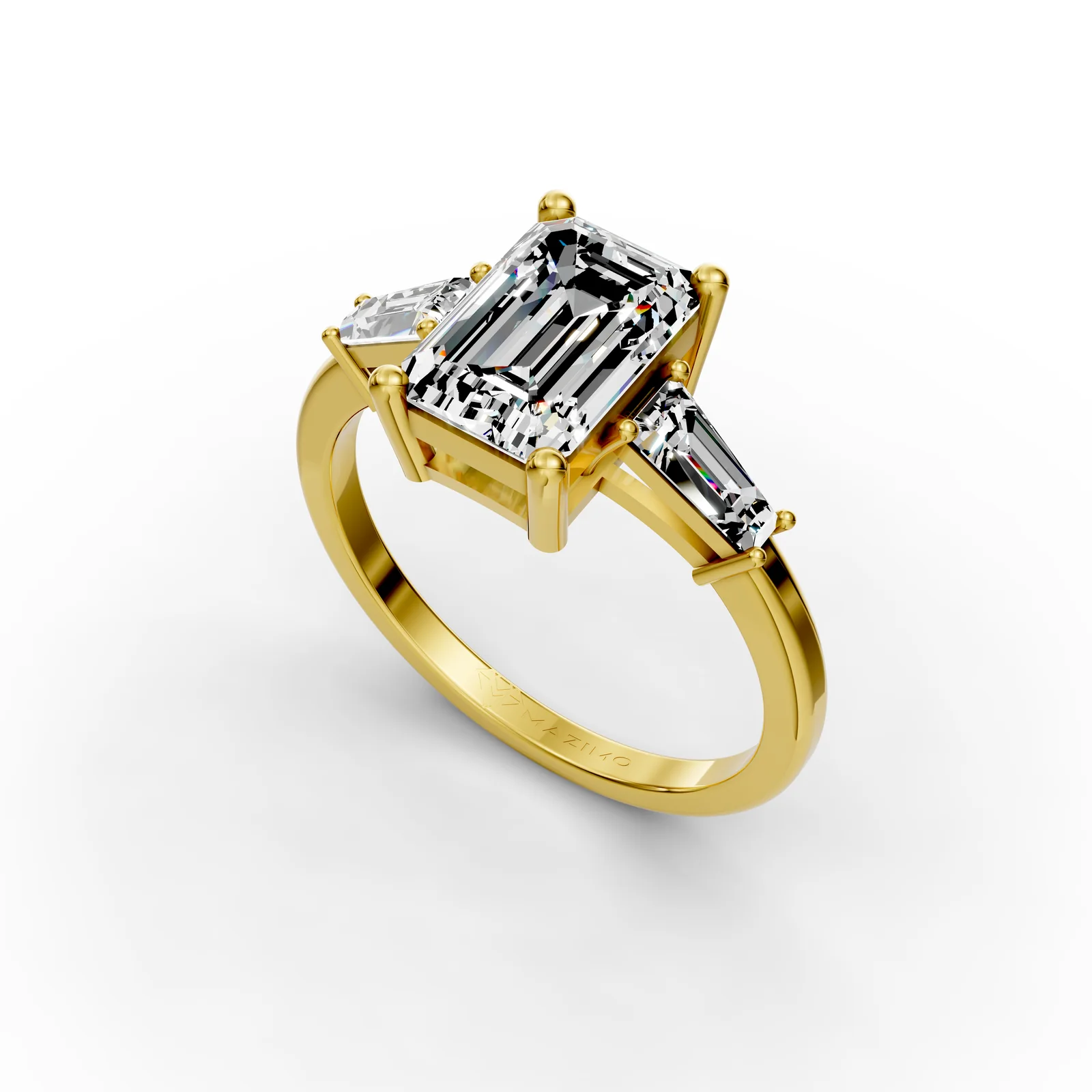 Emerald and Baguette Three Stone Ring in 18K Yellow Gold, 2 ct emerald-cut diamond with two tapered baguettes, angled view
