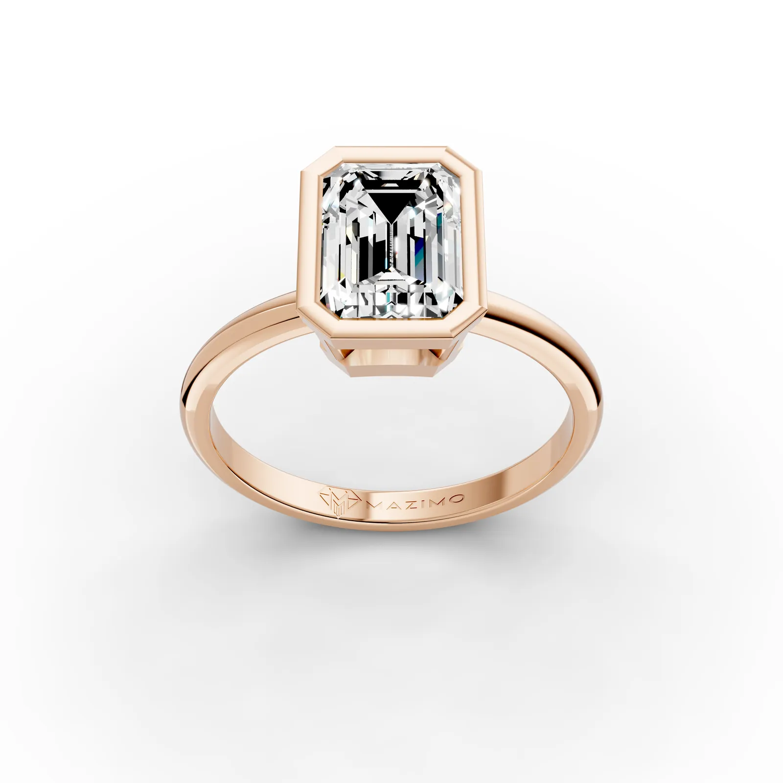Emerald Bezel Solitaire Ring in 18K Rose Gold, 1.5 ct emerald-cut diamond in a smooth bezel on a plain band, three-quarter view