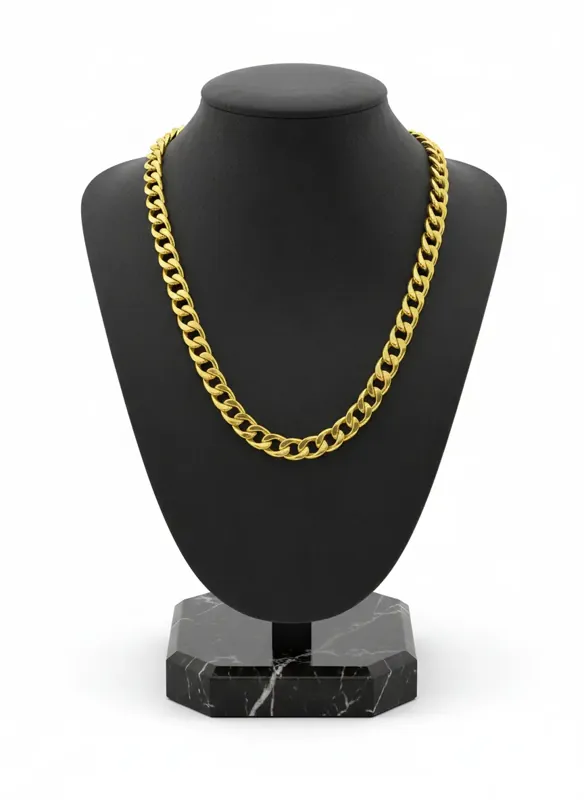 18K gold Cuban link chain necklace displayed on black bust, weighing 26.00 grams