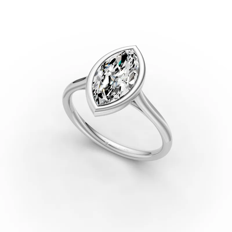 Marquise Bezel Solitaire Ring in 18K White Gold, 1.5 ct marquise diamond in a smooth bezel on a plain band, angled view