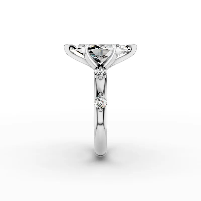 Marquise Side Stone Ring in 18K White Gold, 3 ct marquise diamond in six claws with round diamonds along the band, side profile