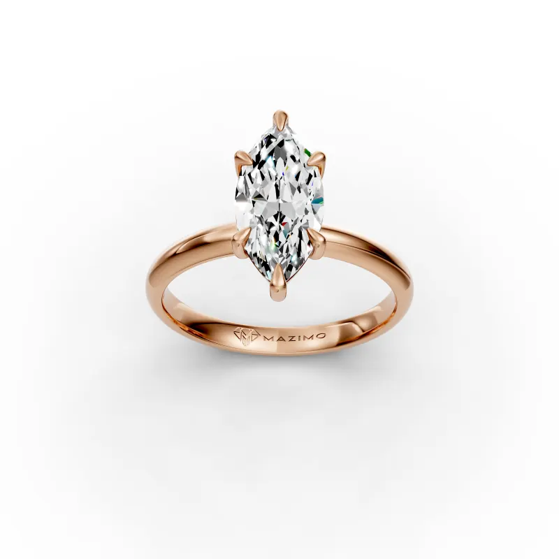The same marquise diamond solitaire in 18K rose gold seen from above, six claws holding the stone on a slim band
