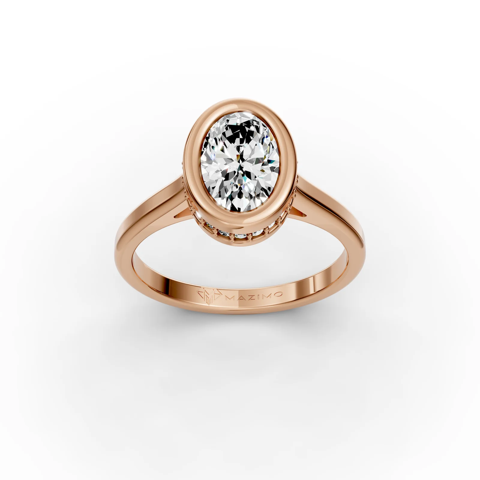 Oval Bezel Solitaire Ring in 18K Rose Gold, 1.5 ct oval diamond in a bezel with a ring of small diamonds below, three-quarter view