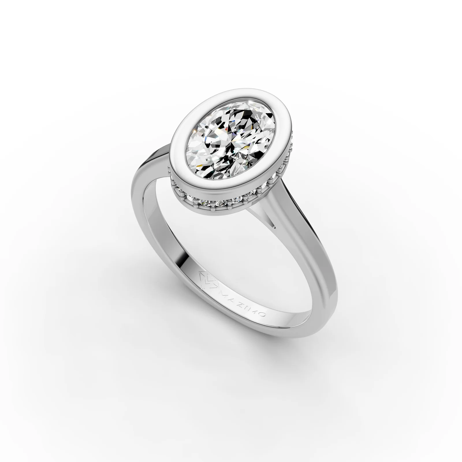 Oval Bezel Solitaire Ring in 18K White Gold, 1.5 ct oval diamond in a bezel with a ring of small diamonds below, angled view
