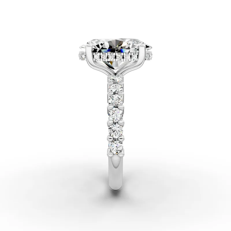 Oval Hidden Halo Shoulders Ring in 18K White Gold, 3.5 ct oval diamond with round diamonds along the band, side profile