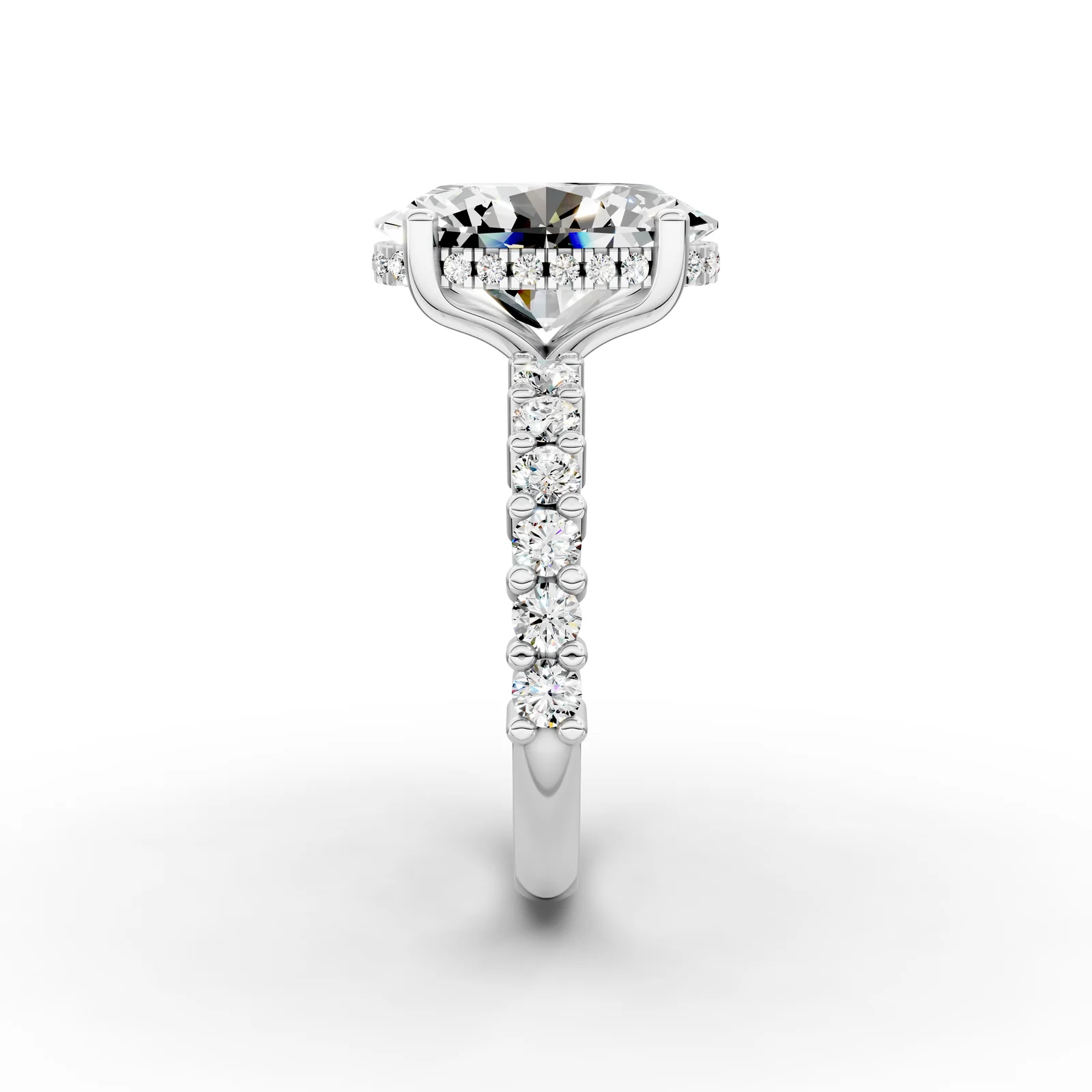 Oval Hidden Halo Shoulders Ring in 18K White Gold, 3.5 ct oval diamond with round diamonds along the band, side profile
