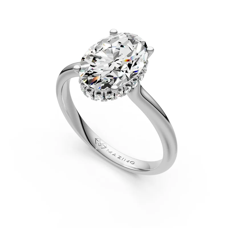 Oval Hidden Halo Solitaire Ring, 1.5 ct in 18K White Gold, 1.5 ct oval diamond in four claws with a hidden diamond halo, angled view