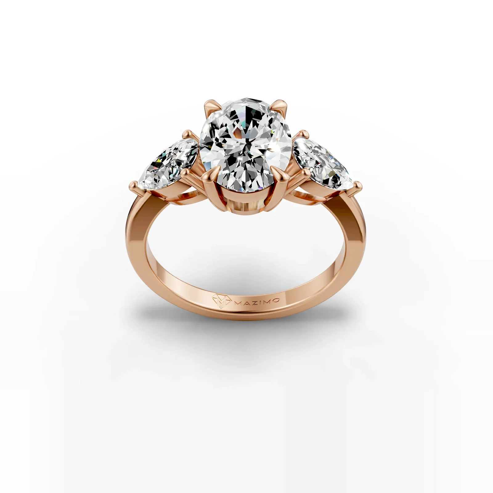 Oval and Pear Three Stone Ring in 18K Rose Gold, three-quarter view