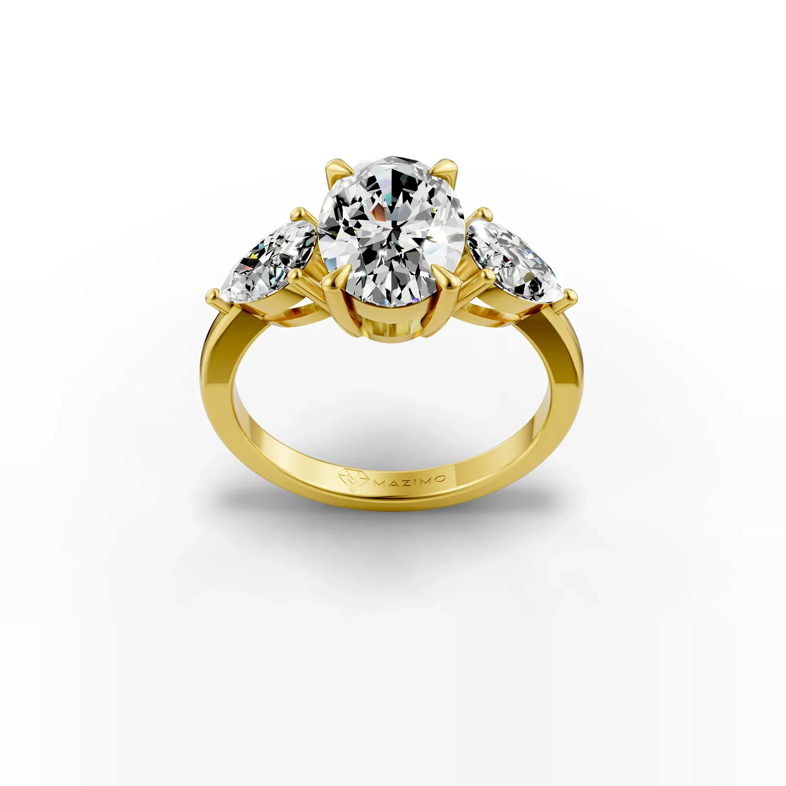 Oval and Pear Three Stone Ring in 18K Yellow Gold, three-quarter view