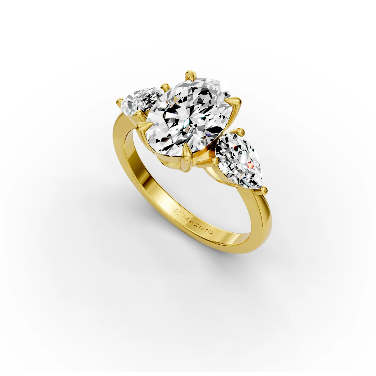 Oval and Pear Three Stone Ring in 18K Yellow Gold, angled view