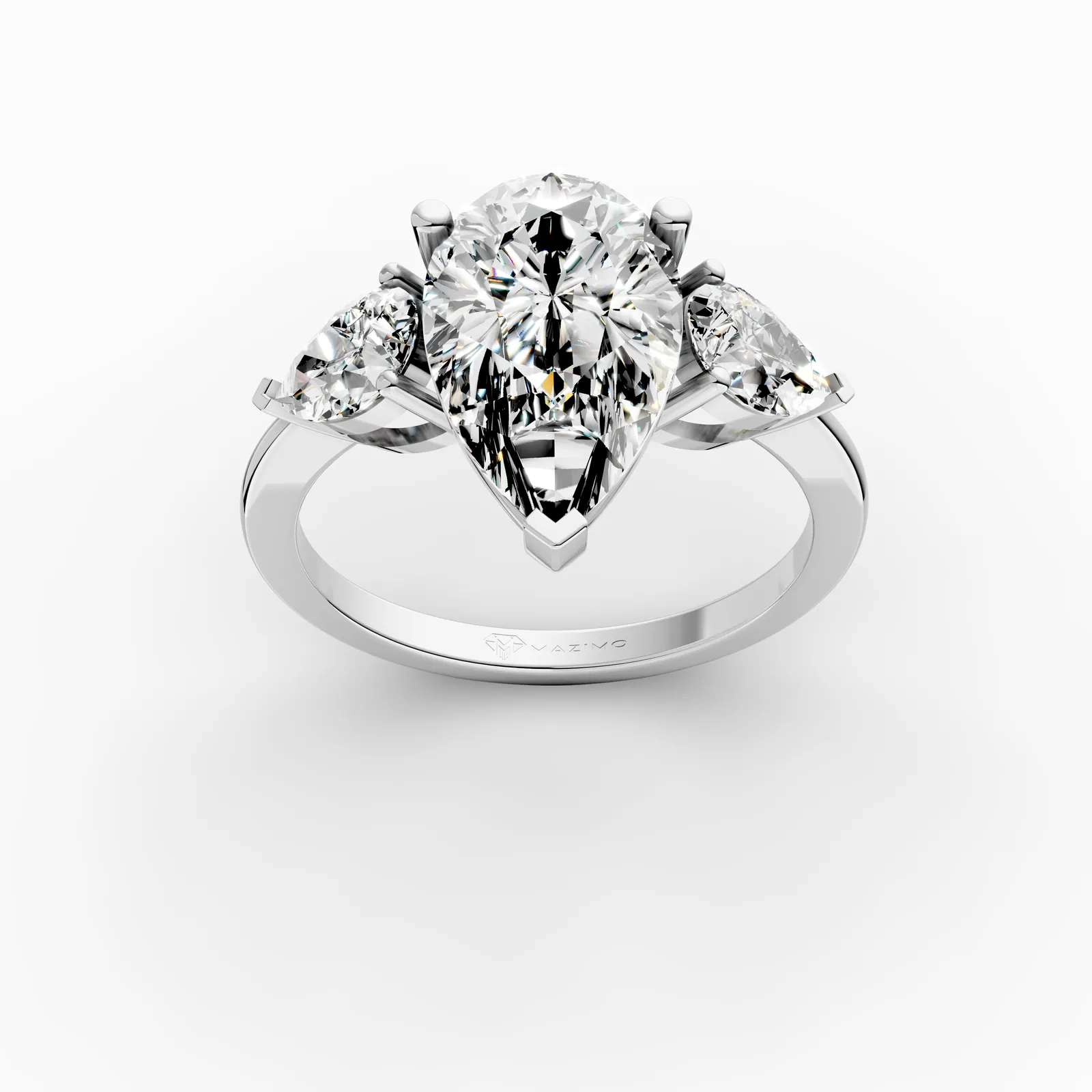 Pear Three Stone Ring in 18K White Gold, 2 ct pear diamond with a pear diamond on each side, three-quarter view