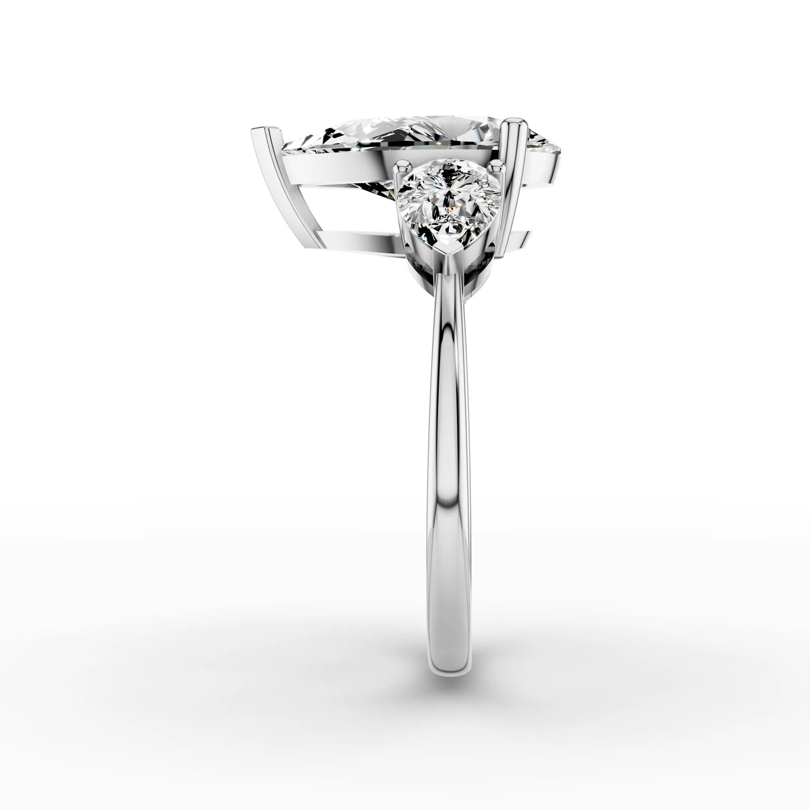 Pear Three Stone Ring in 18K White Gold, 2 ct pear diamond with a pear diamond on each side, side profile