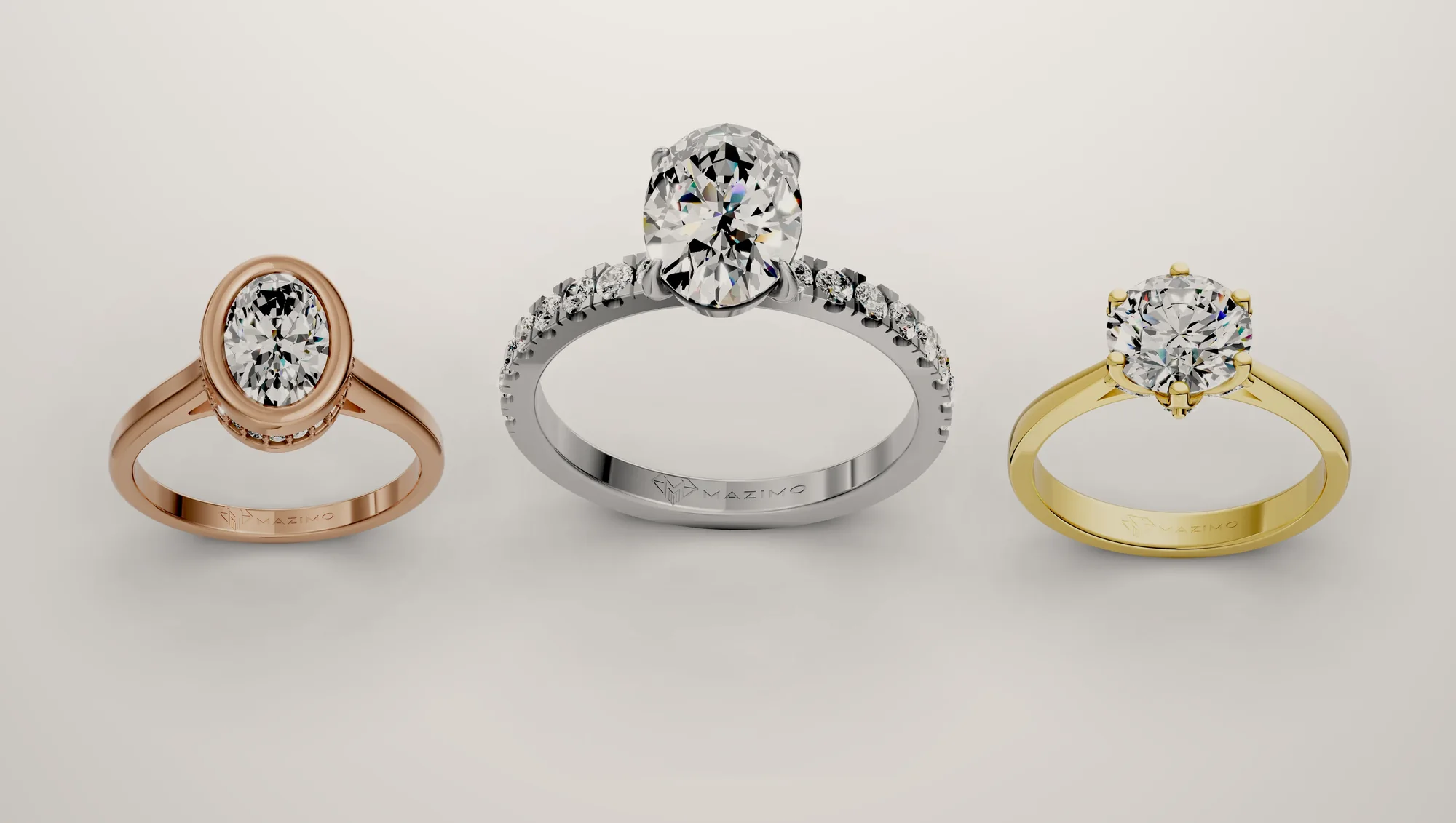 Three Mazimo diamond rings in white, yellow and rose gold: Oval Bezel Solitaire Ring, Oval Pavé Solitaire Ring and Round Six Claw Solitaire Ring