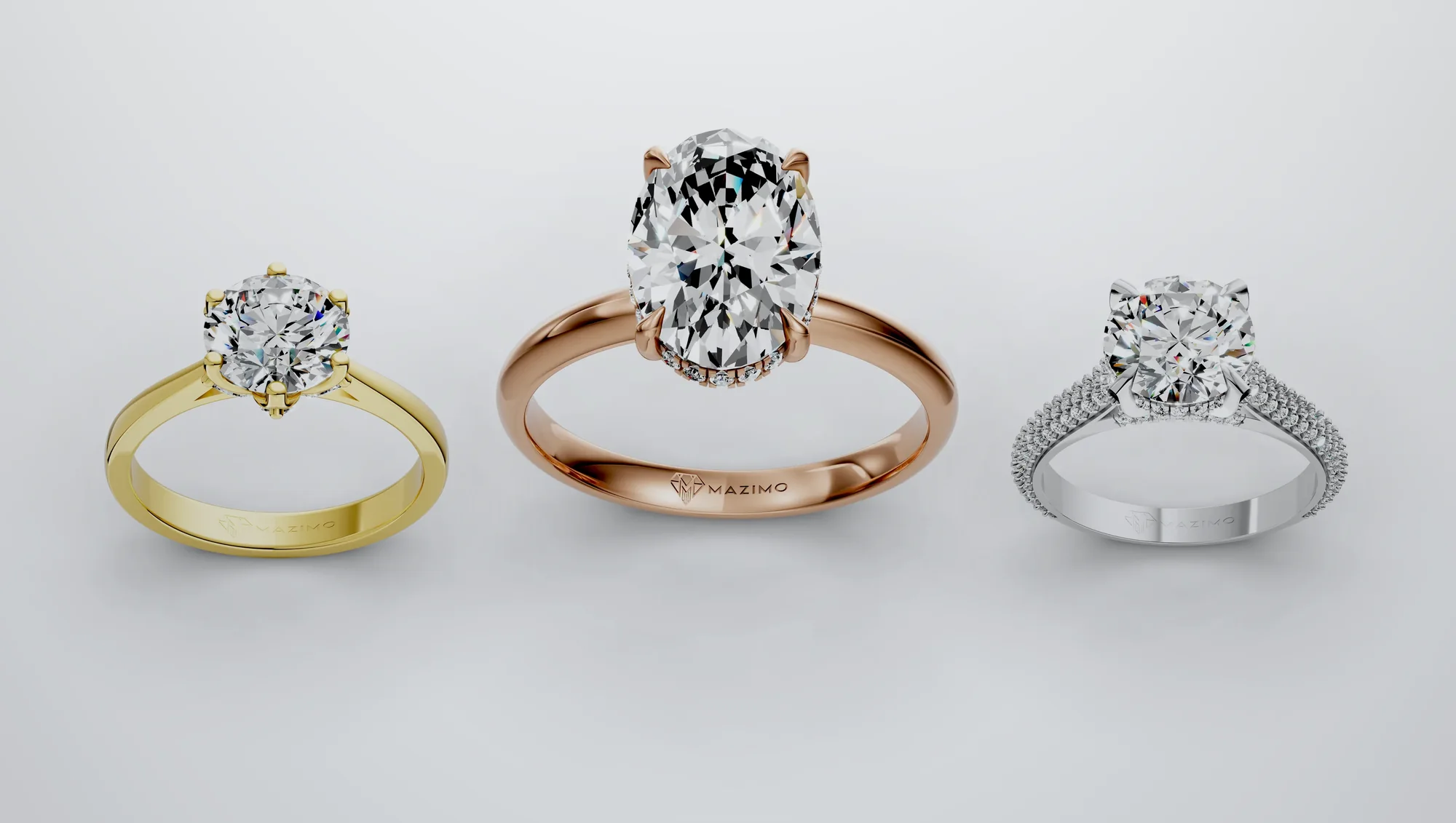 ثلاثة خواتم ألماس من مازيمو بالذهب الأبيض والأصفر والوردي: Round Six Claw Solitaire Ring، Oval Hidden Halo Solitaire Ring، Round Pavé Solitaire Ring