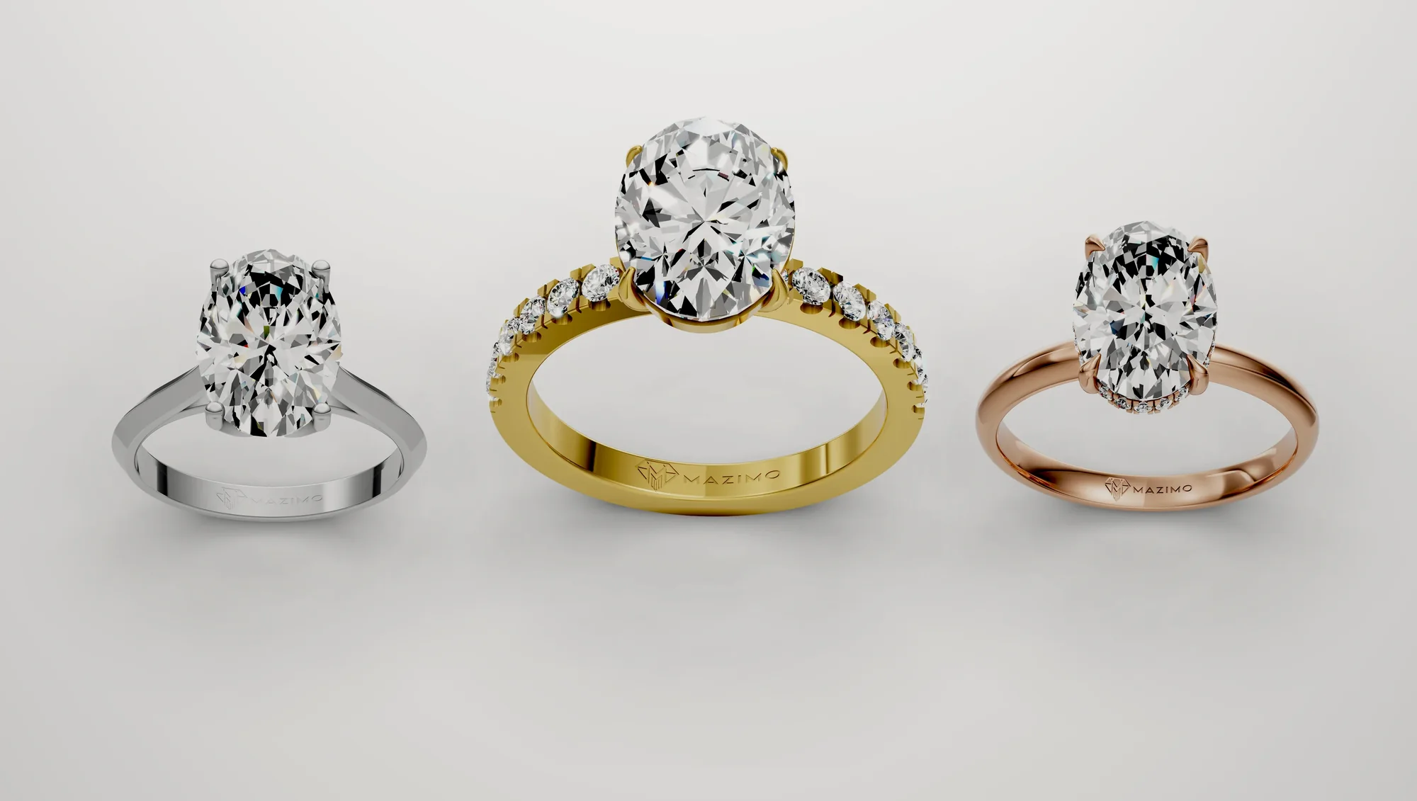 ثلاثة خواتم ألماس من مازيمو بالذهب الأبيض والأصفر والوردي: Oval Solitaire Ring وOval Pavé Solitaire Ring وOval Hidden Halo Solitaire Ring