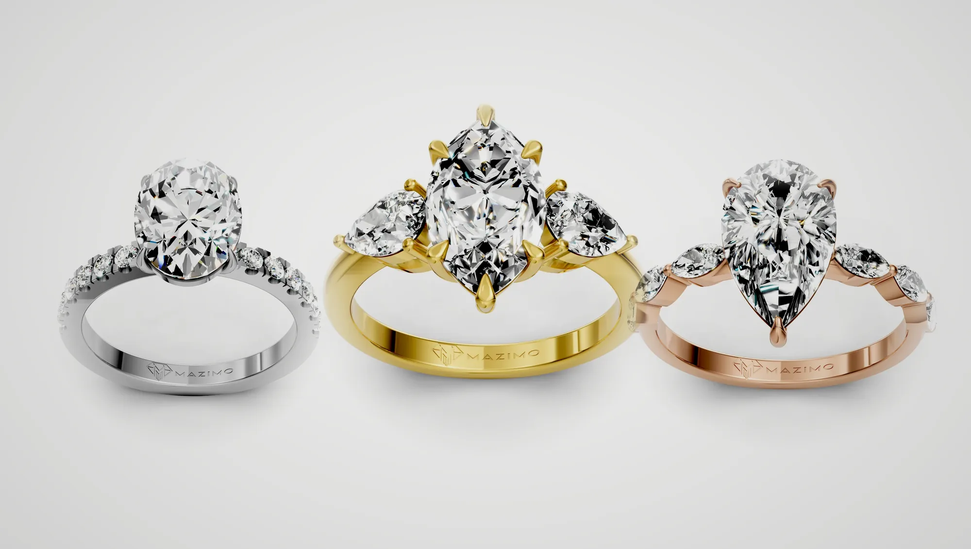 Three Mazimo diamond rings in white, yellow and rose gold: Oval Pavé Solitaire Ring, 2 ct; Marquise and Pear Three Stone Ring, 2 ct; and Pear Marquise Shoulders Ring