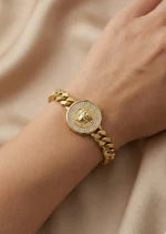 18K Italian gold Medusa bracelet worn on wrist with diamond halo
