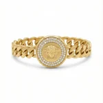 18K Italian gold bracelet with Medusa coin and diamond halo on white background