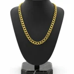 18K gold Cuban link chain necklace displayed on black bust, weighing 26.00 grams