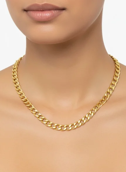 8K gold Cuban link chain necklace displayed on black bust, weighing 26.00 grams
