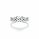 18K white gold solitaire diamond ring with round center stone and pavé shoulders, 3.25 grams