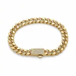18K gold Mazimo collection diamond Cuban link bracelet with pavé diamond clasp and diamond-accented links, 23.10 grams