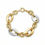 18K gold Mazimo collection oval link bracelet with textured gold rings and white gold accents, 11.40 grams