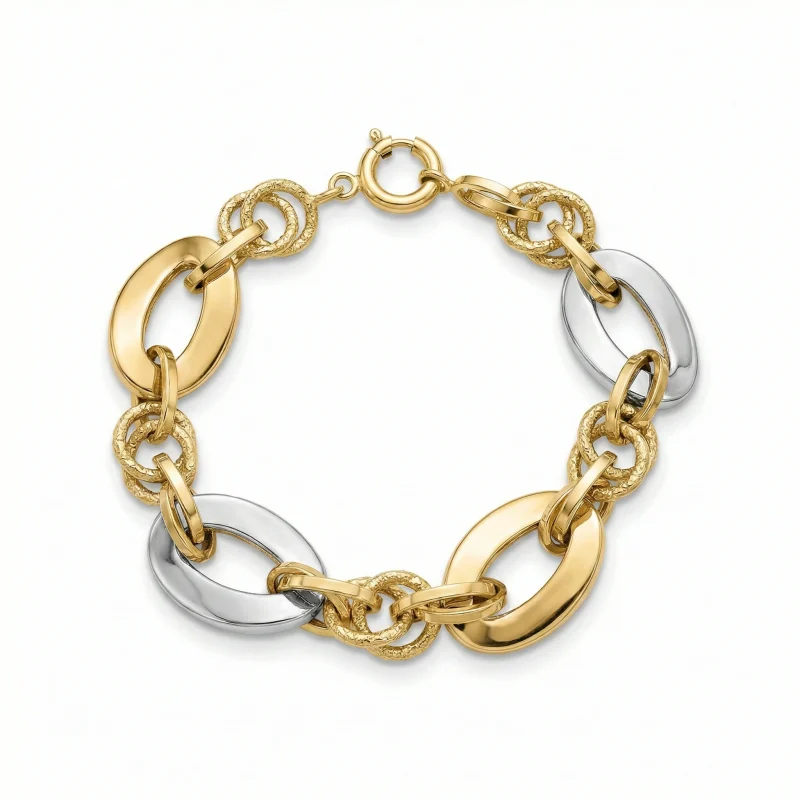 18K gold Mazimo collection oval link bracelet with textured gold rings and white gold accents, 11.40 grams