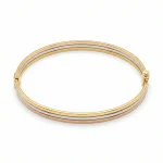 18K gold Mazimo collection tri-tone slim bangle with yellow, white, and rose gold bands, 7.40 grams