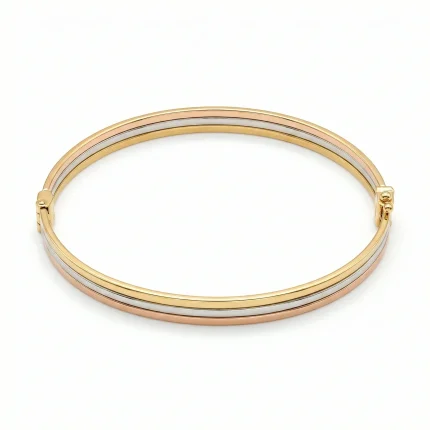 18K gold Mazimo collection tri-tone slim bangle with yellow, white, and rose gold bands, 7.40 grams