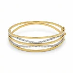 18K gold Mazimo collection diamond wave bangle with pavé-set diamonds and polished gold curves, 10.80 grams