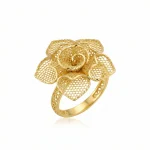 21K gold flower design ring with textured details on a model hand and white background